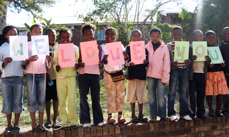 Children greet the donors in Germany