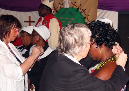 Silver crosses are given to the voluntary helpers